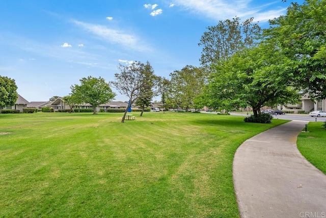 8933 Yolo Cir Unit 1308-A, Huntington Beach, CA 92646 - surrounding community with a lawn and a residential view