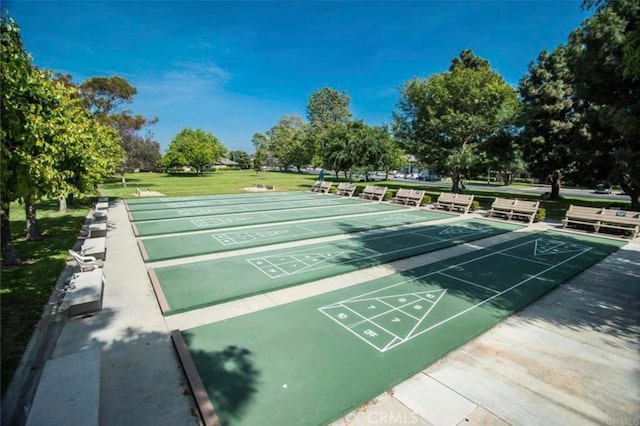 8933 Yolo Cir Unit 1308-A, Huntington Beach, CA 92646 - surrounding community with a yard and shuffleboard