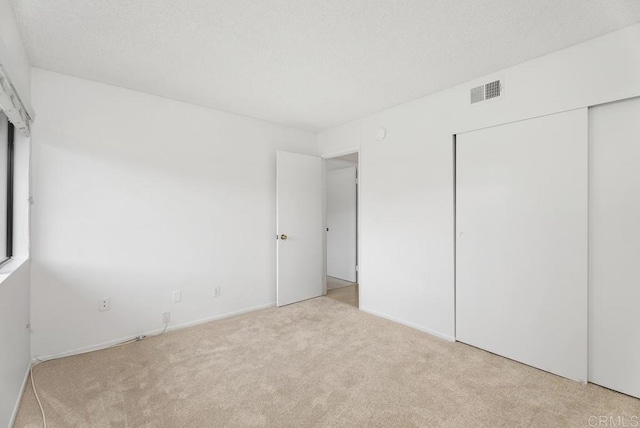 8933 Yolo Cir Unit 1308-A, Huntington Beach, CA 92646 - unfurnished bedroom with carpet flooring and a closet