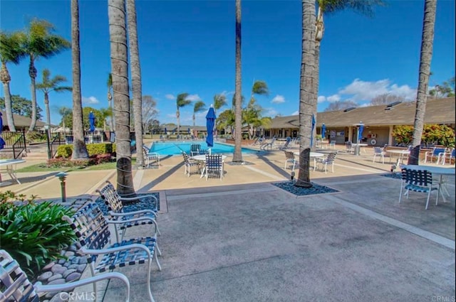 8933 Yolo Cir Unit 1308-A, Huntington Beach, CA 92646 - view of property's community with a pool and a patio