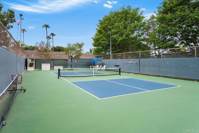8933 Yolo Cir Unit 1308-A, Huntington Beach, CA 92646 - view of tennis court with community basketball court