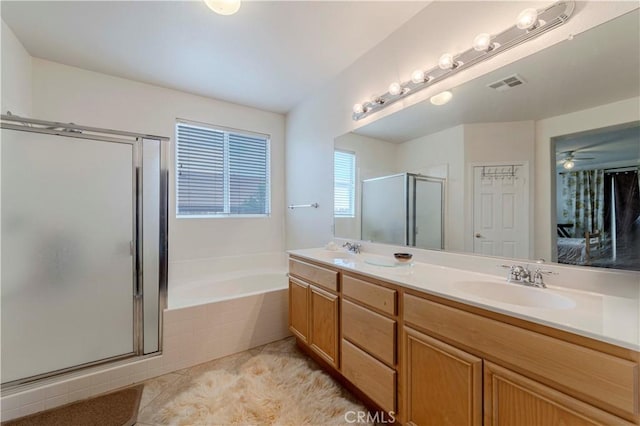 13868 Rosemary St, Hesperia, CA 92344 - ensuite bathroom featuring a shower stall, double vanity, a bath, tile patterned floors, and ceiling fan