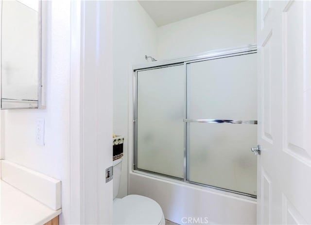 13868 Rosemary St, Hesperia, CA 92344 - bathroom with toilet, vanity, and bath / shower combo with glass door