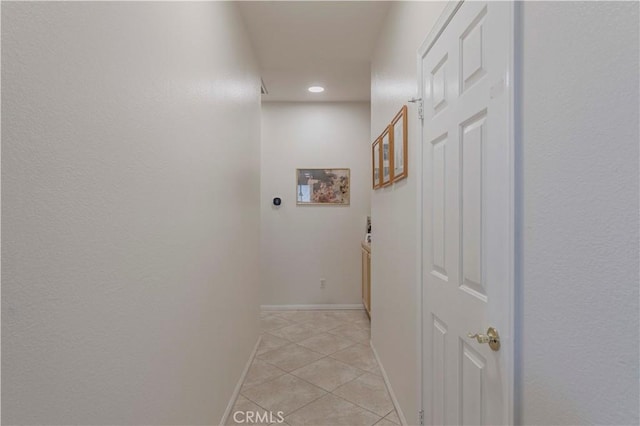 13868 Rosemary St, Hesperia, CA 92344 - hall with light tile patterned floors, recessed lighting, and baseboards