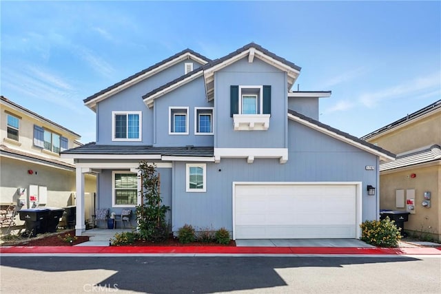 1782 Park Place Ln, Riverside, CA 92501 - view of front of property featuring covered porch, a garage, and a tiled roof