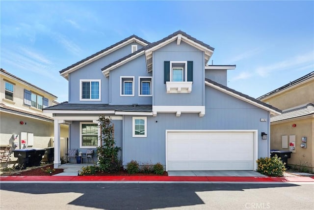 1782 Park Place Ln, Riverside, CA 92501 - view of front of property with a porch, a garage, and a tiled roof