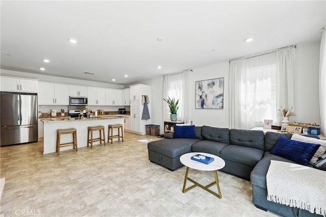 1782 Park Place Ln, Riverside, CA 92501 - living area featuring plenty of natural light and recessed lighting