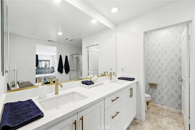 1782 Park Place Ln, Riverside, CA 92501 - bathroom featuring double vanity, toilet, an enclosed shower, ensuite bath, and recessed lighting
