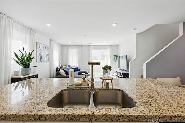 1782 Park Place Ln, Riverside, CA 92501 - kitchen featuring open floor plan, light stone counters, and recessed lighting