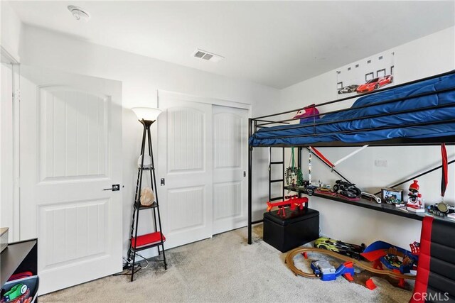 1782 Park Place Ln, Riverside, CA 92501 - carpeted bedroom with a closet