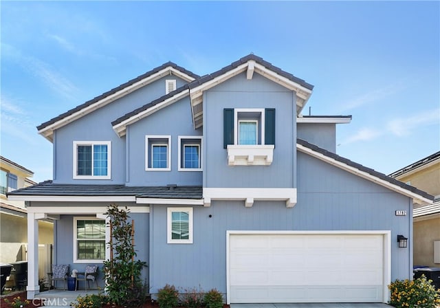 1782 Park Place Ln, Riverside, CA 92501 - view of front of home with covered porch and concrete driveway