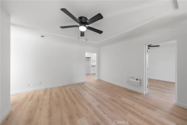 407 W 107th St, Los Angeles, CA 90003 - empty room featuring light wood-style flooring, ceiling fan, and baseboards