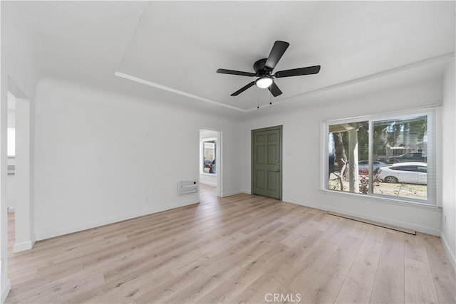 407 W 107th St, Los Angeles, CA 90003 - empty room with wood finished floors, ceiling fan, and baseboards