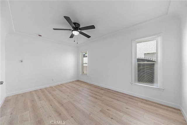 407 W 107th St, Los Angeles, CA 90003 - spare room with light wood-type flooring, a ceiling fan, and baseboards