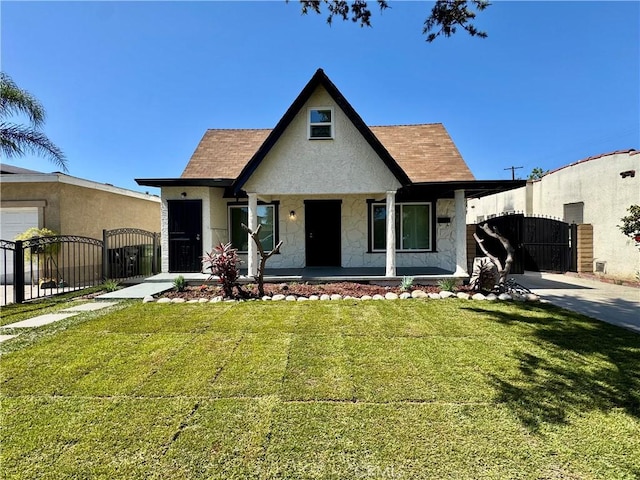 407 W 107th St, Los Angeles, CA 90003 - view of front of house featuring a gate, stone siding, a porch, stucco siding, and a shingled roof