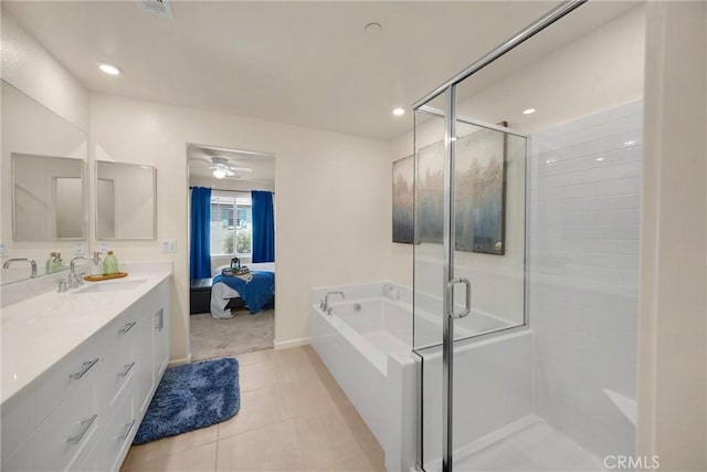 1095 W Buttercup Ln, Rialto, CA 92376 - bathroom featuring a stall shower, vanity, a bath, connected bathroom, and recessed lighting