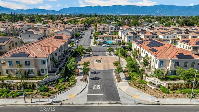 1095 W Buttercup Ln, Rialto, CA 92376 - aerial view of residential area featuring a mountain backdrop