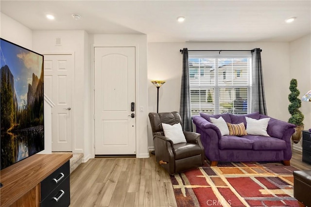 1095 W Buttercup Ln, Rialto, CA 92376 - living area with light wood-type flooring and recessed lighting