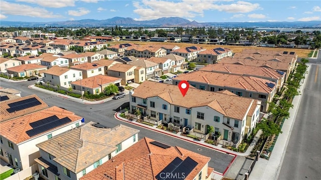 1095 W Buttercup Ln, Rialto, CA 92376 - aerial view of residential area with a mountain backdrop