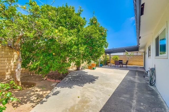 817 Cedar Ave, Chula Vista, CA 91911 - fenced backyard featuring a patio area and outdoor dining area