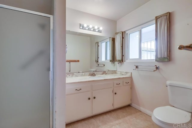 817 Cedar Ave, Chula Vista, CA 91911 - bathroom with toilet, vanity, a shower stall, baseboards, and tile patterned flooring