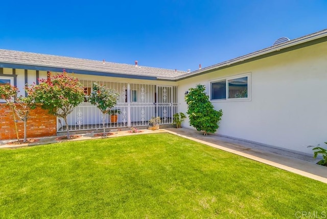 817 Cedar Ave, Chula Vista, CA 91911 - entrance to property with a lawn, stucco siding, and a porch