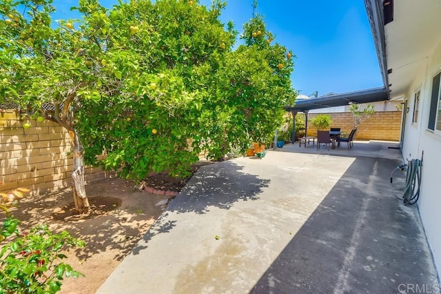 817 Cedar Ave, Chula Vista, CA 91911 - fenced backyard with a patio and outdoor dining area