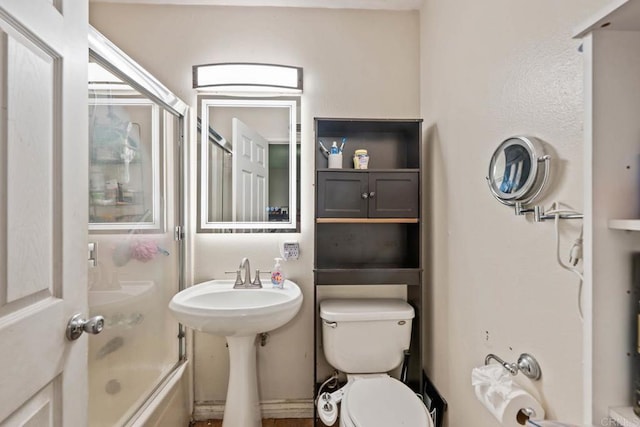 865 Worthington St, San Diego, CA 92114 - full bathroom featuring toilet and combined bath / shower with glass door