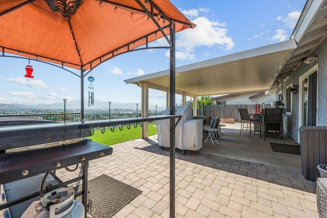 865 Worthington St, San Diego, CA 92114 - view of patio with outdoor dining space, a gazebo, and a mountain view