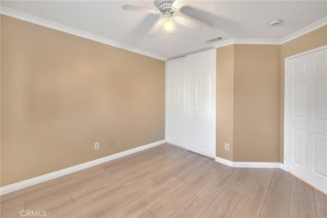 12415 Brianwood Dr, Riverside, CA 92503 - unfurnished bedroom featuring baseboards, light wood finished floors, crown molding, a closet, and a ceiling fan