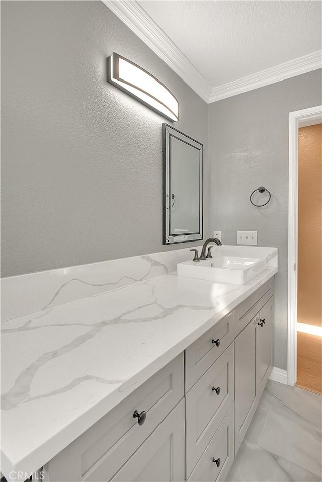 12415 Brianwood Dr, Riverside, CA 92503 - bathroom with vanity, ornamental molding, marble look tile flooring, and a textured ceiling