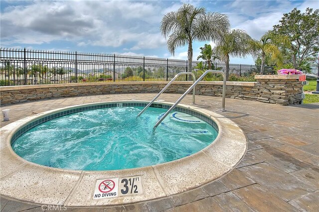 12415 Brianwood Dr, Riverside, CA 92503 - view of swimming pool featuring a hot tub and a pool