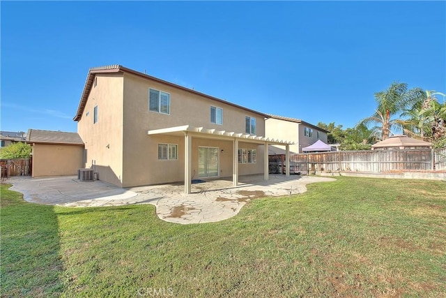 12415 Brianwood Dr, Riverside, CA 92503 - rear view of house with a pergola, a patio area, stucco siding, and central AC unit