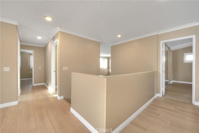 12415 Brianwood Dr, Riverside, CA 92503 - hallway with an upstairs landing, light wood-style floors, ornamental molding, recessed lighting, and baseboards
