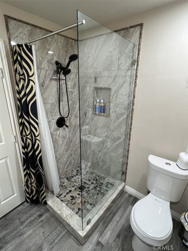 108 Limestone Rd, Claremont, CA 91711 - full bath with toilet, wood finished floors, a shower stall, and baseboards
