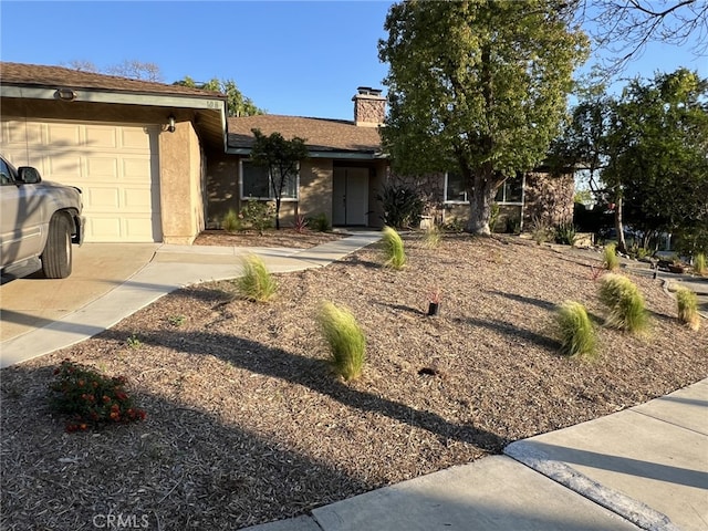 108 Limestone Rd, Claremont, CA 91711 - single story home featuring a garage, a chimney, stucco siding, and driveway