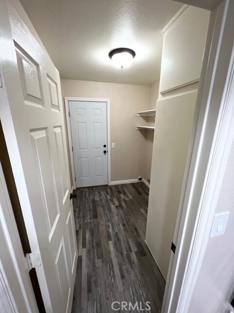 108 Limestone Rd, Claremont, CA 91711 - washroom featuring dark wood-type flooring and baseboards