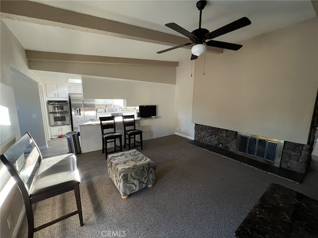 108 Limestone Rd, Claremont, CA 91711 - living room with a ceiling fan, dark carpet, vaulted ceiling, and a fireplace
