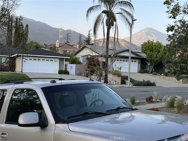 108 Limestone Rd, Claremont, CA 91711 - view of front facade featuring a mountain view and a garage