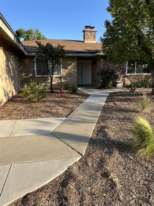 108 Limestone Rd, Claremont, CA 91711 - entrance to property featuring a chimney and roof with shingles