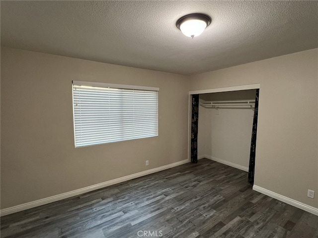 108 Limestone Rd, Claremont, CA 91711 - unfurnished bedroom featuring dark wood-style flooring, a closet, a textured ceiling, and baseboards