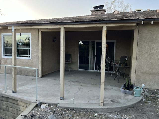 108 Limestone Rd, Claremont, CA 91711 - back of property with a patio, stucco siding, and roof with shingles