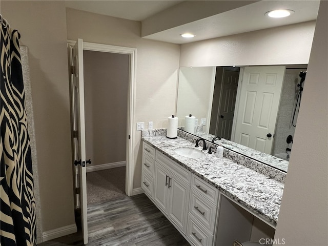 108 Limestone Rd, Claremont, CA 91711 - bathroom featuring vanity, wood finished floors, baseboards, and a shower with shower curtain