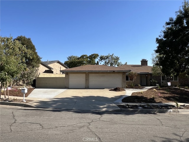 108 Limestone Rd, Claremont, CA 91711 - single story home with driveway, an attached garage, stucco siding, and a chimney