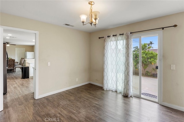 4950 N Treanor Ave, Covina, CA 91724 - empty room featuring wood finished floors, baseboards, a chandelier, and a ceiling fan