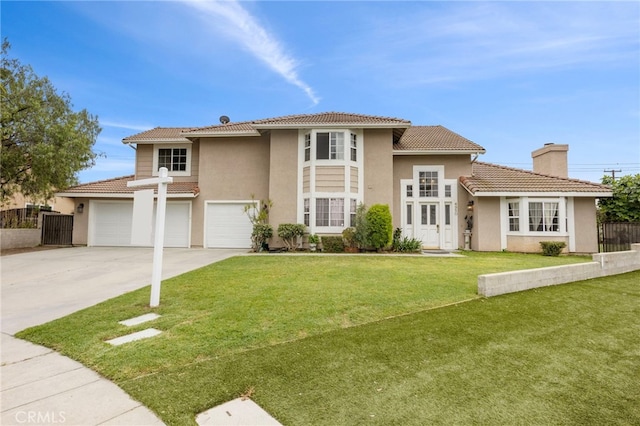 4950 N Treanor Ave, Covina, CA 91724 - mediterranean / spanish-style home with a tile roof, stucco siding, and driveway