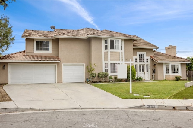 4950 N Treanor Ave, Covina, CA 91724 - view of front facade with a tile roof, driveway, an attached garage, a front lawn, and stucco siding