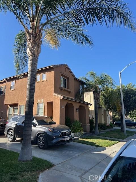 3762 Segovia Dr, Perris, CA 92571 - view of front of home with stucco siding