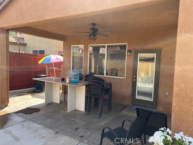 3762 Segovia Dr, Perris, CA 92571 - view of patio / terrace with a ceiling fan