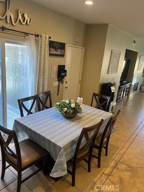 3762 Segovia Dr, Perris, CA 92571 - dining room featuring light tile patterned flooring and recessed lighting